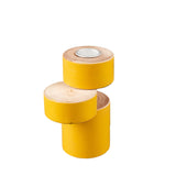 Kerzenhalter Balance aus handgearbeiteter Esche im ausbalancierten Design gelb