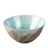 Salatschüssel Katja aus grauem Steinzeug mit türkiser Innenglasur, leer.